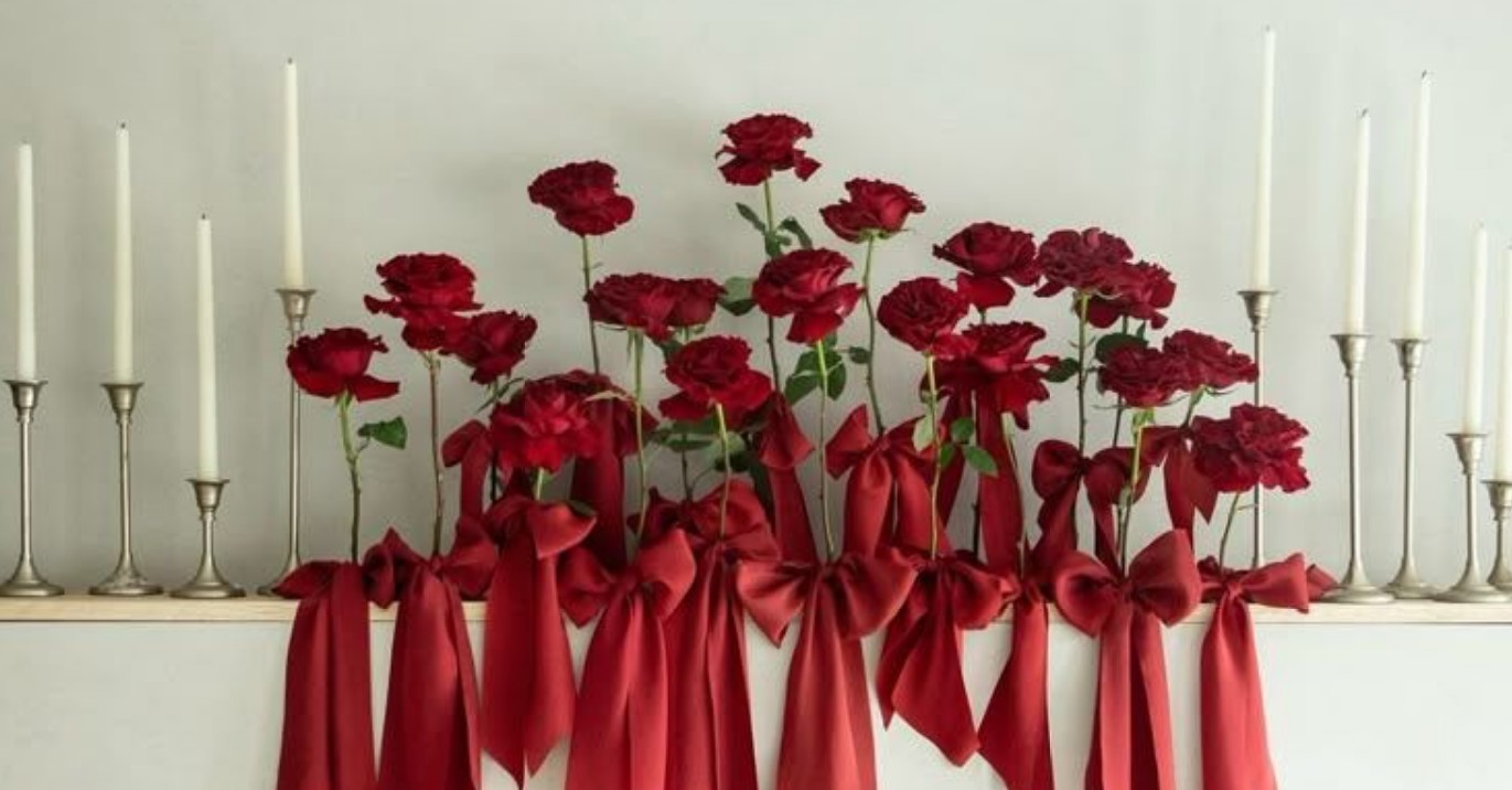 Rose rosse e candele
